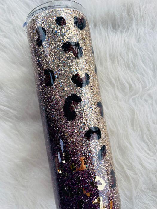 http://vinylchaosdesignco.com/cdn/shop/files/Purple-Leopard-Glitter-Tumbler-30oz-Skinny-Ready-To-Ship-Vinyl-Chaos-Design-Co-435.jpg?v=1683809914