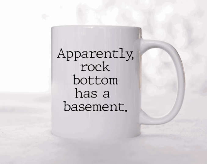 Rock Bottom Has A Basement | 15oz Ceramic Coffee Cup Vinyl Chaos Design Co.
