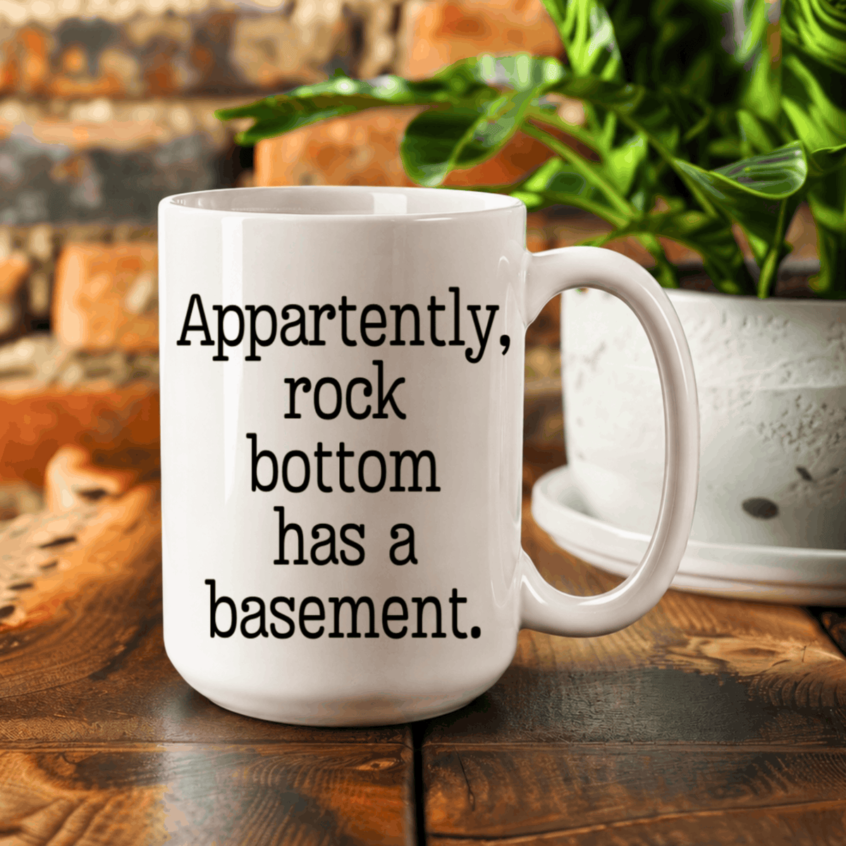 Funny 15 oz ceramic coffee mug with dark humor quote about hitting rock bottom and finding a basement.