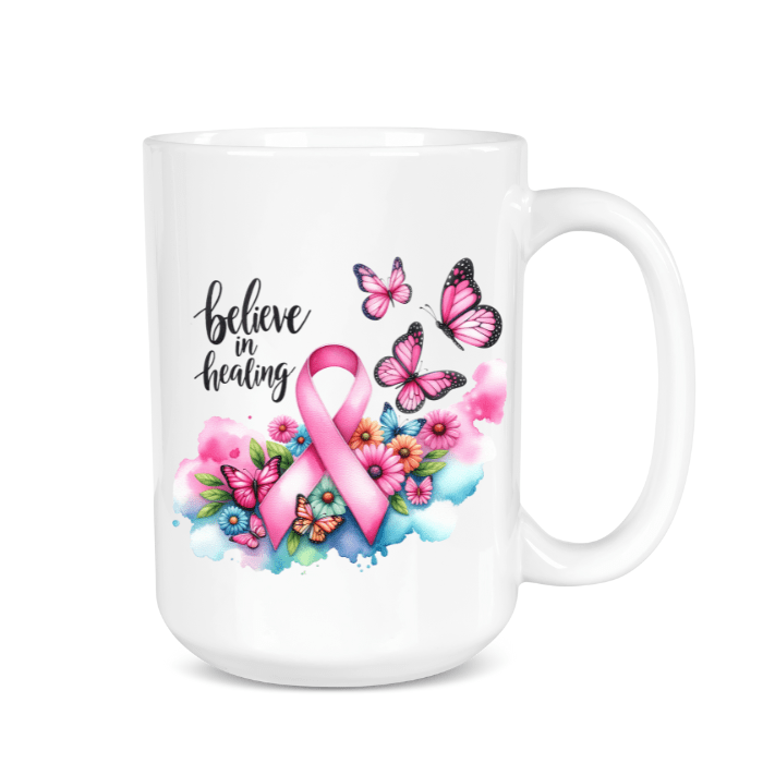 White mug with pink breast cancer awareness ribbon, butterflies, and flowers on a white background