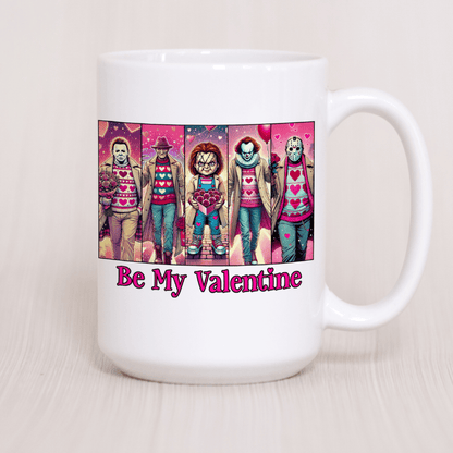 White mug with a colorful graphic of people in Valentine's Day-themed outfits and 'Be My Valentine' text on a light background.