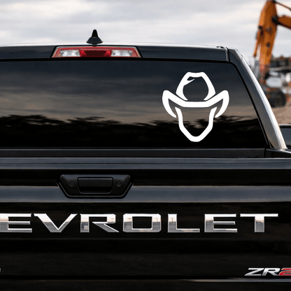 Chevrolet vehicle with a white cowboy hat decal on the back window
