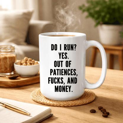 Funny 15 oz novelty coffee mug featuring bold black distressed lettering and a snarky saying about running out of patience and money.