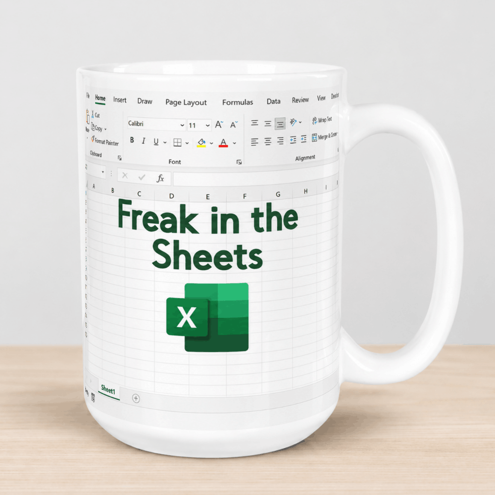 A white ceramic mug printed with an Excel spreadsheet interface and the text 'Freak in the Sheets' in dark green, with the green Excel logo below. The mug is shown on a light wood surface against a neutral gray background.