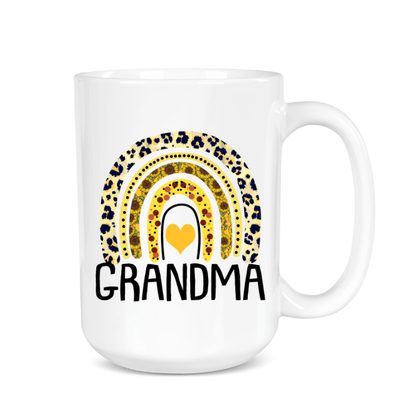White mug with leopard print rainbow and heart design, featuring the word 'Grandma'.