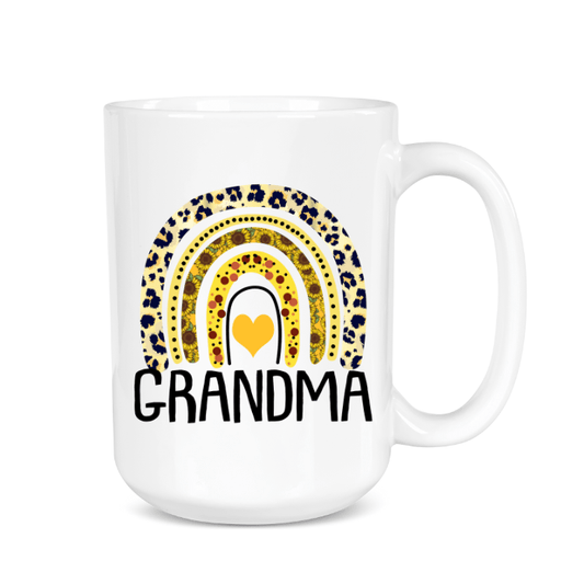 White mug with leopard print rainbow and heart design, featuring the word 'Grandma'.