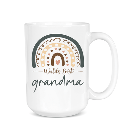 White mug with rainbow design and 'Worlds Best Grandma' text on a white background