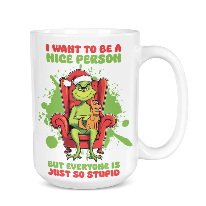 Mug with Grinch character and text 'I want to be a nice person but everyone is just so stupid' on a white background