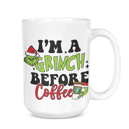 White mug with Grinch-themed text and graphics on a white background