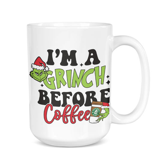 White mug with Grinch-themed text and graphics on a white background