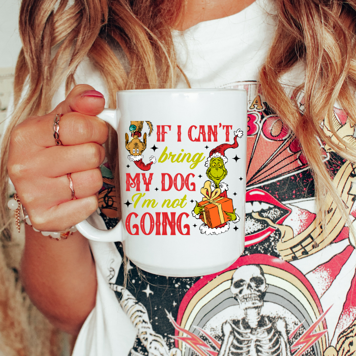 Person holding a mug with a humorous design and text.