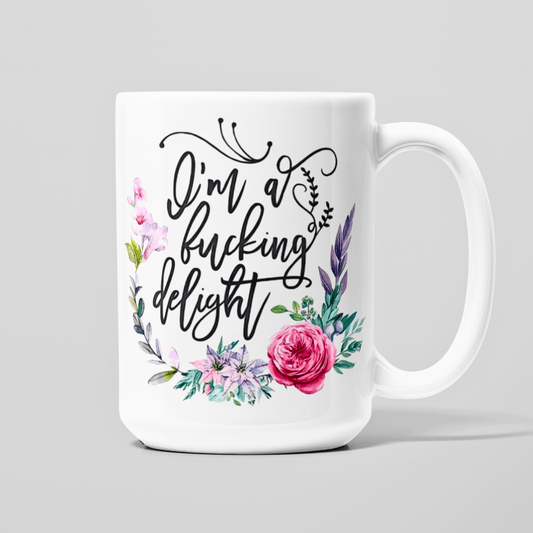 15 oz white coffee mug with “I’m a Fucking Delight” floral design