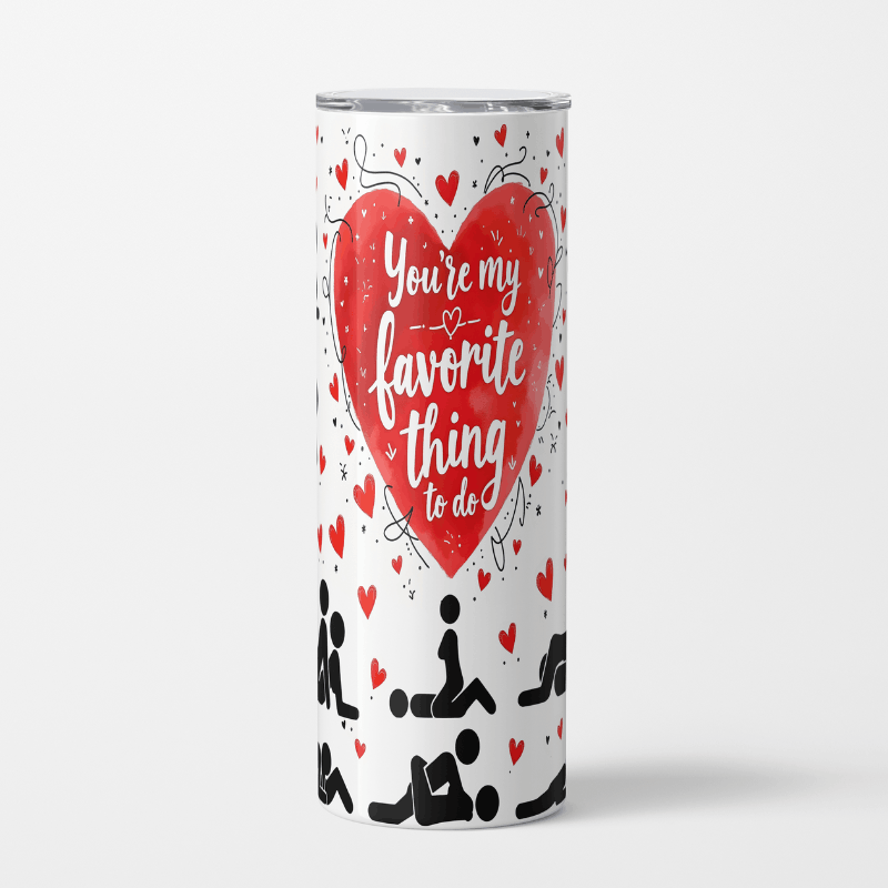 Tumbler with a red heart and text on a white background