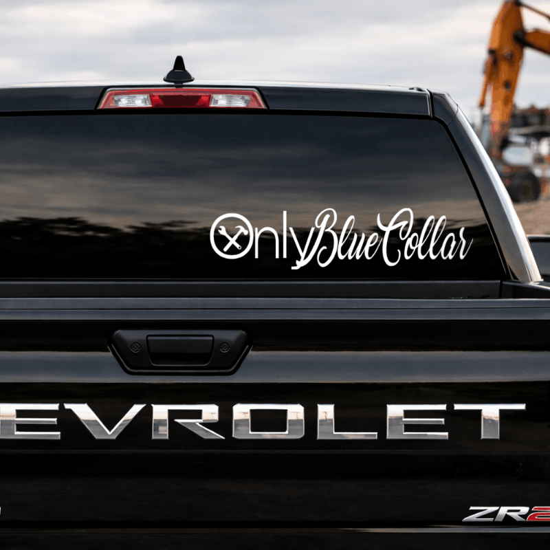 Back of a black Chevrolet truck with 'Only Blue Collar' decal