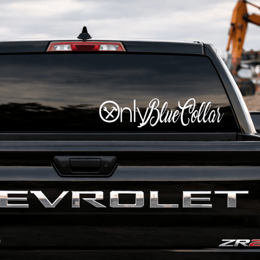 Back of a black Chevrolet truck with 'Only Blue Collar' decal