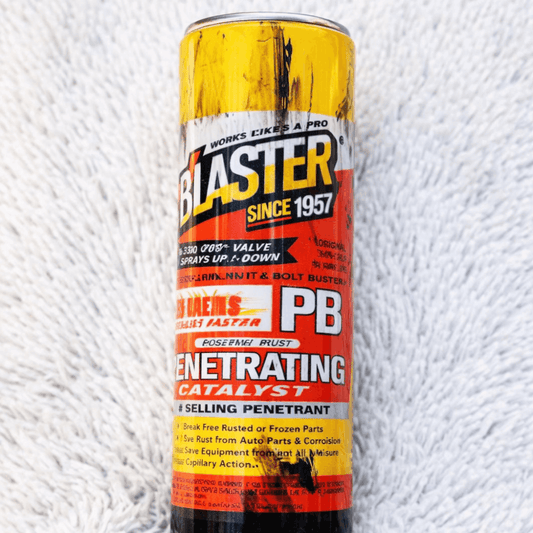 Can of Blaster PB penetrating catalyst on a textured white background