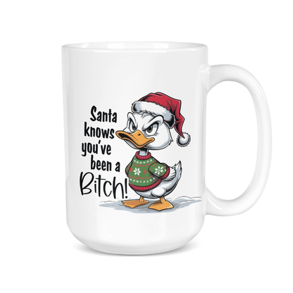 White mug with a cartoon duck wearing a Santa hat and sweater, and text on a white background.