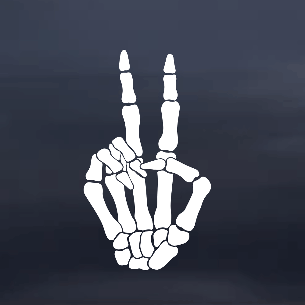 Skeleton hand making a peace sign on a dark background