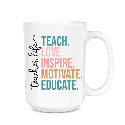 White mug with colorful text 'Teacher Life Teach Love Inspire Motivate Educate' on a white background