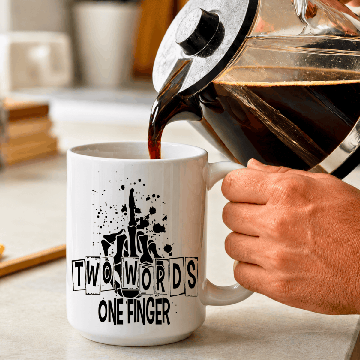 White novelty coffee mug with Two Words One Finger design, featuring distressed black typography and edgy adult humor.