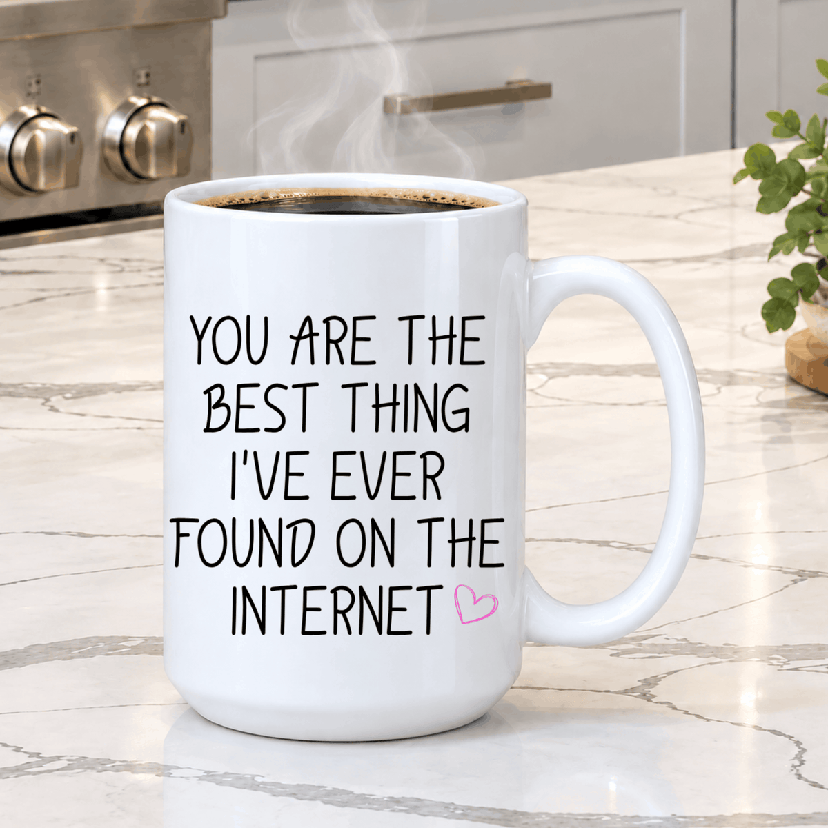 White ceramic love coffee mug featuring a sweet internet relationship quote in black text with pink heart accent.