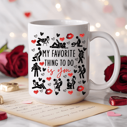 Mug with romantic design and text 'My favorite thing to do is you' on a decorative background with roses and cards.