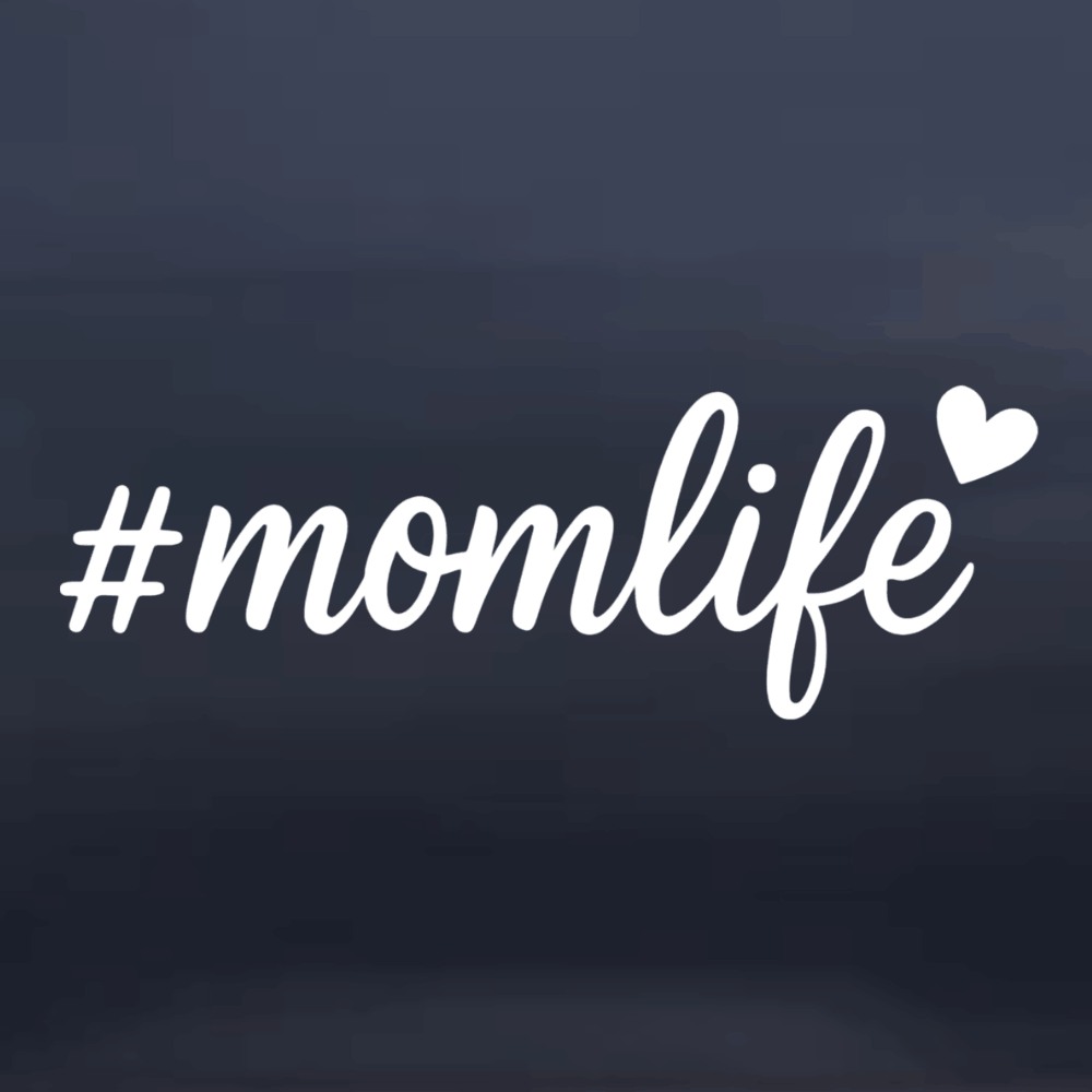 White '#momlife' text with a heart on a dark blue background